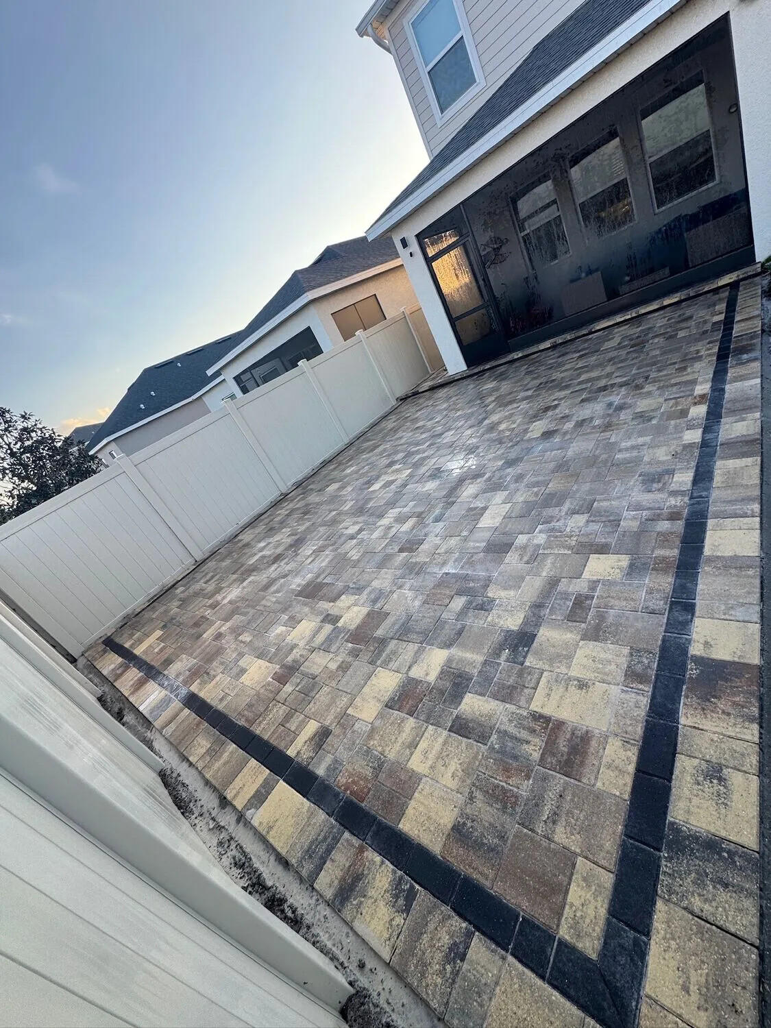 Completed backyard paver patio on a Viera home in Brevard County