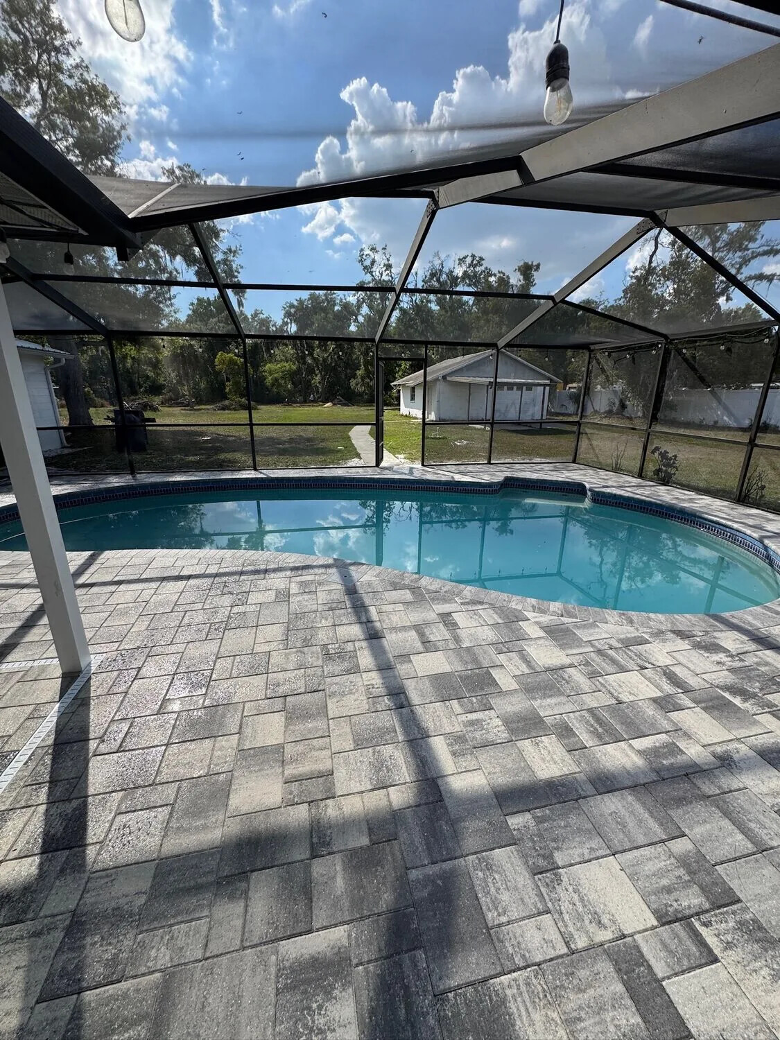 Aluminum pool screen enclosure on a Merritt Island home